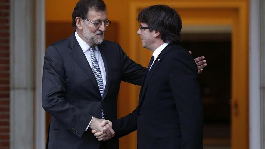 Rajoy y Puigdemont en el pasado. Imagen de archivo. EFE