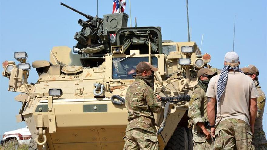 Resultado de imagen de Fuerzas estadounidenses de la coalición internacional y milicias kurdas