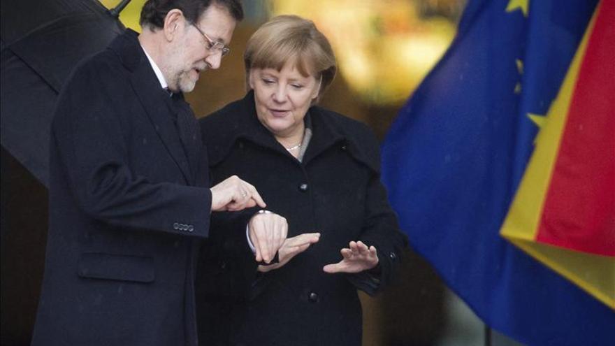 Merkel reitera su "respeto y admiración" por las reformas españolas ante Rajoy