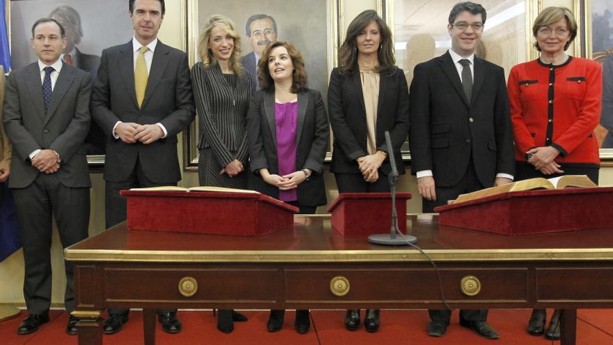 Edelmira Barreira, entre la vicepresidenta Soraya Sáez de Santamaría y el exministro José Manuel Soria