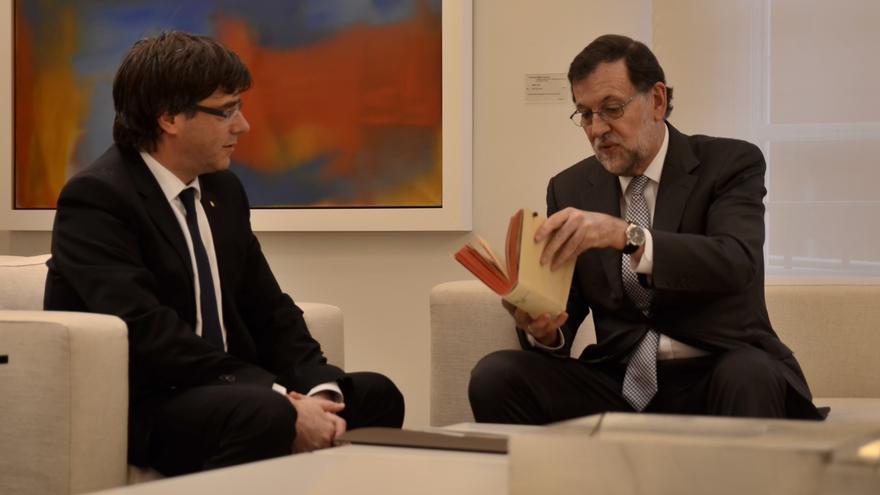 Rajoy defiende a un "magnífico" Montoro que ha cumplido "a satisfacción"